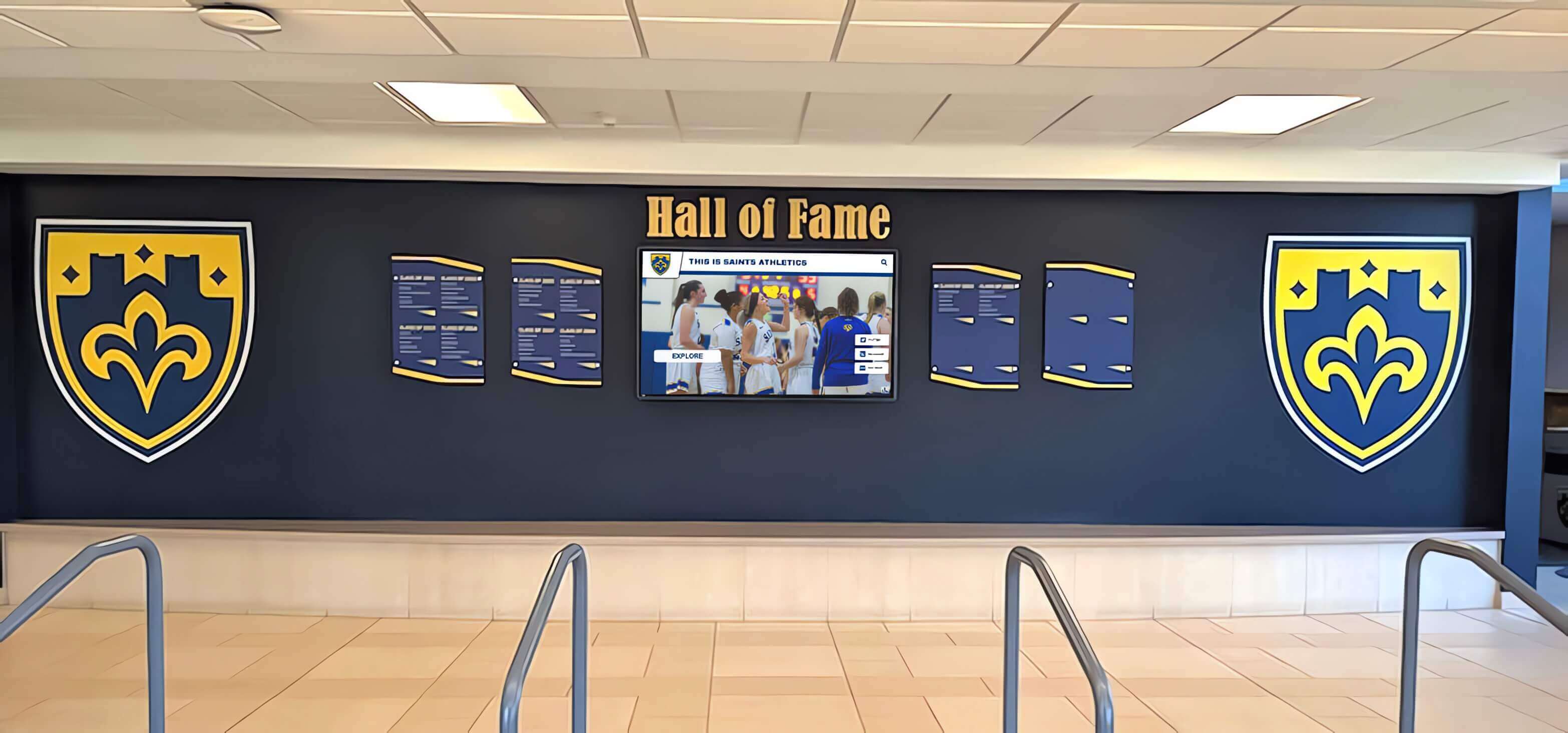 Traditional donor wall with physical plaques and digital display